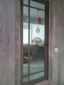 Puerta l. nal. pesada color champange, con barrotillo español